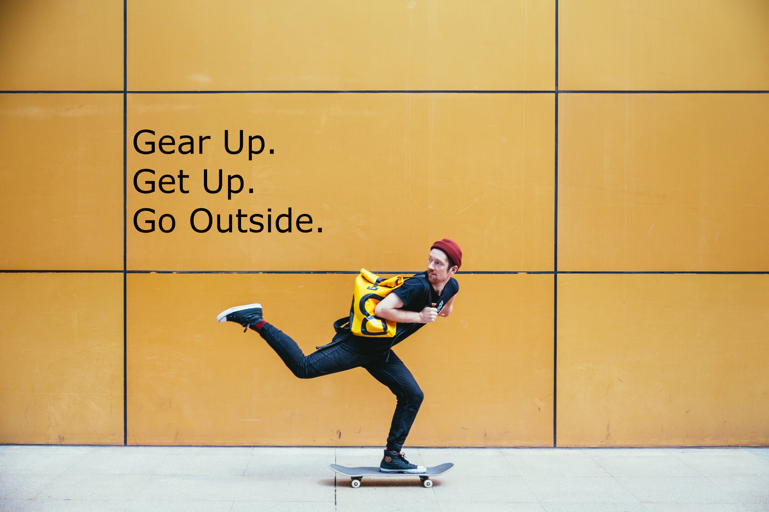 Brush On Block image of skateboarder passing wall with Gear Up Get Up Go Outside