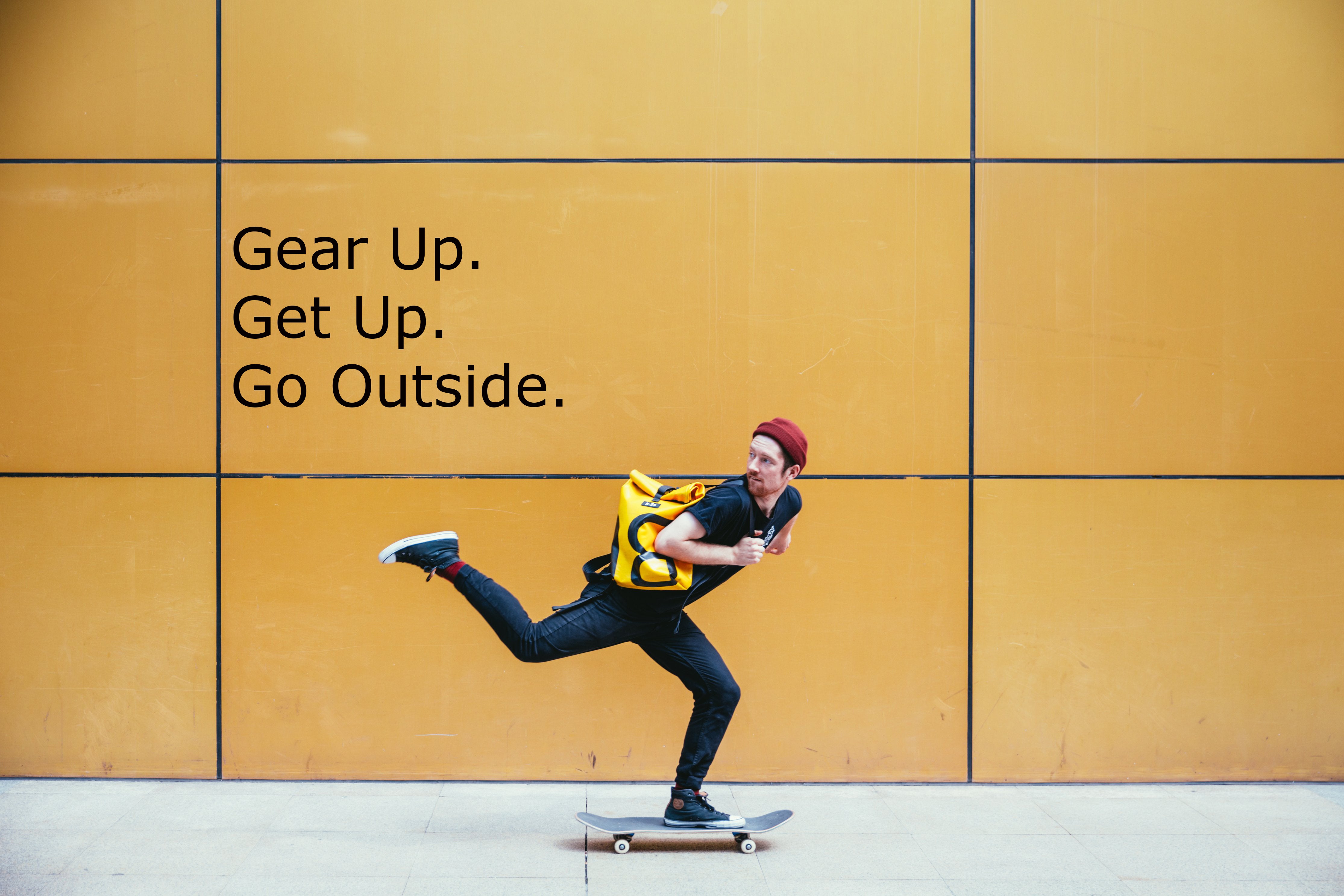 Brush On Block image of skateboarder passing wall with Gear Up Get Up Go Outside