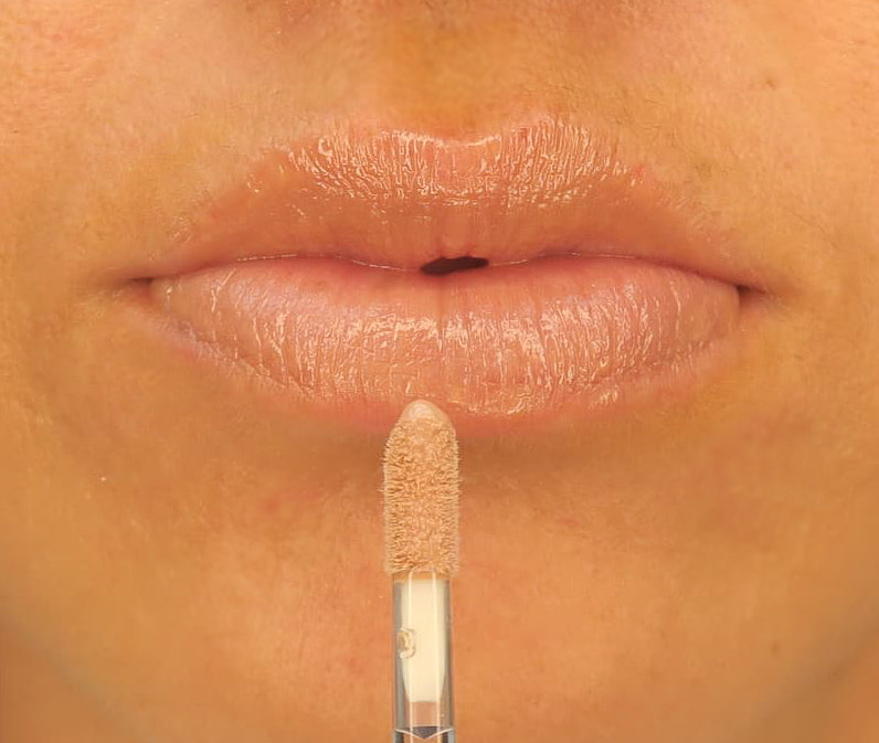 Brush On Block image of lips wearing Protective Lip Oil