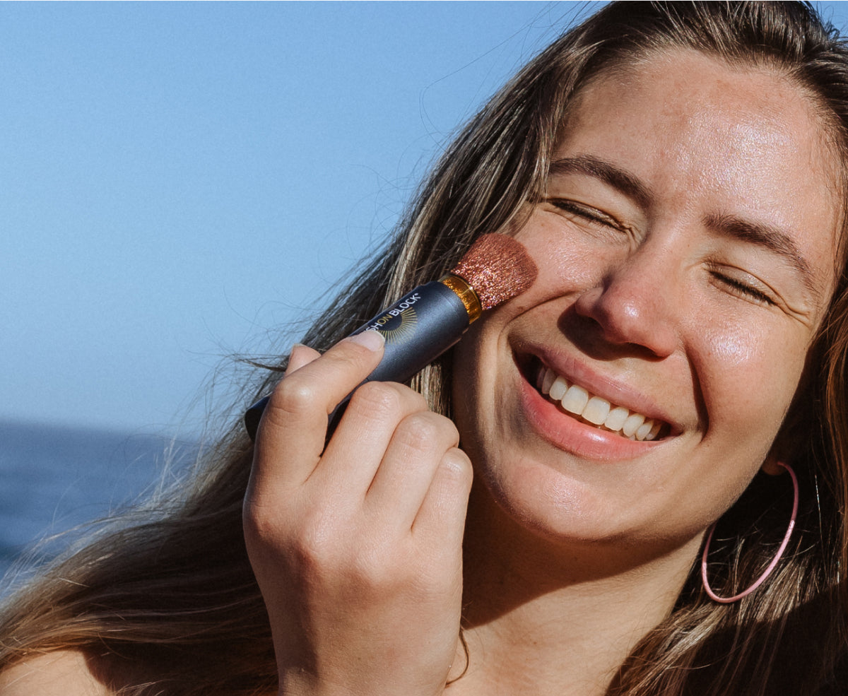 Applying Brush On Block SPF 30