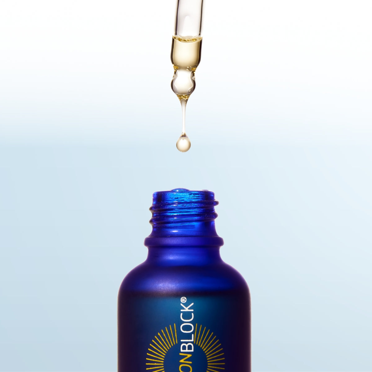 Nobody's Perfect Daily Face Oil lifestyle shot mineral sunscreen brush applicator