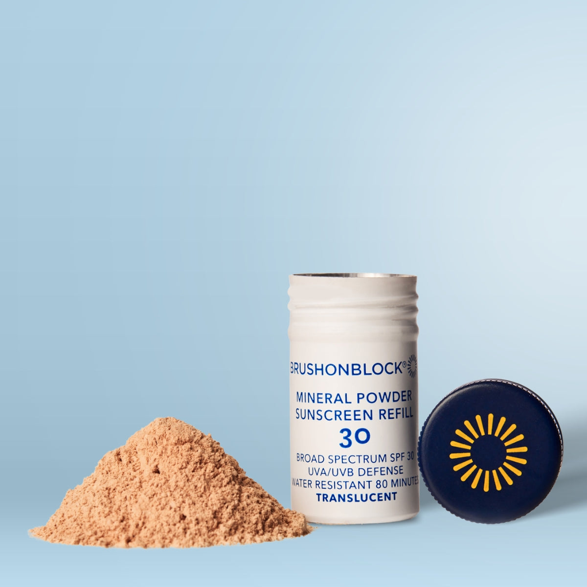 Translucent Mineral Powder Sunscreen Refill SPF 30 lifestyle shot mineral sunscreen brush applicator
