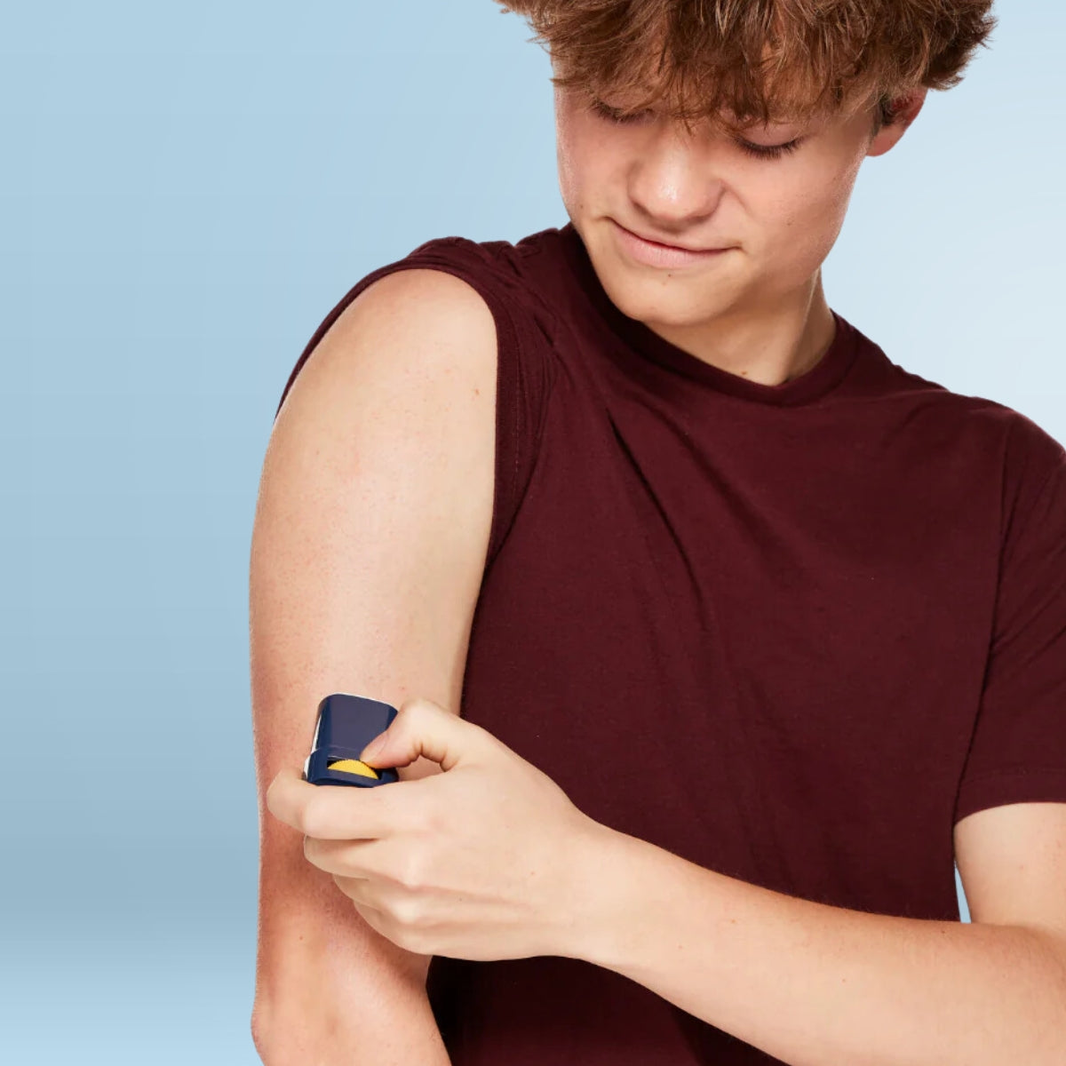 Quick Stick SPF 40 Mineral Sunscreen lifestyle shot mineral sunscreen brush applicator