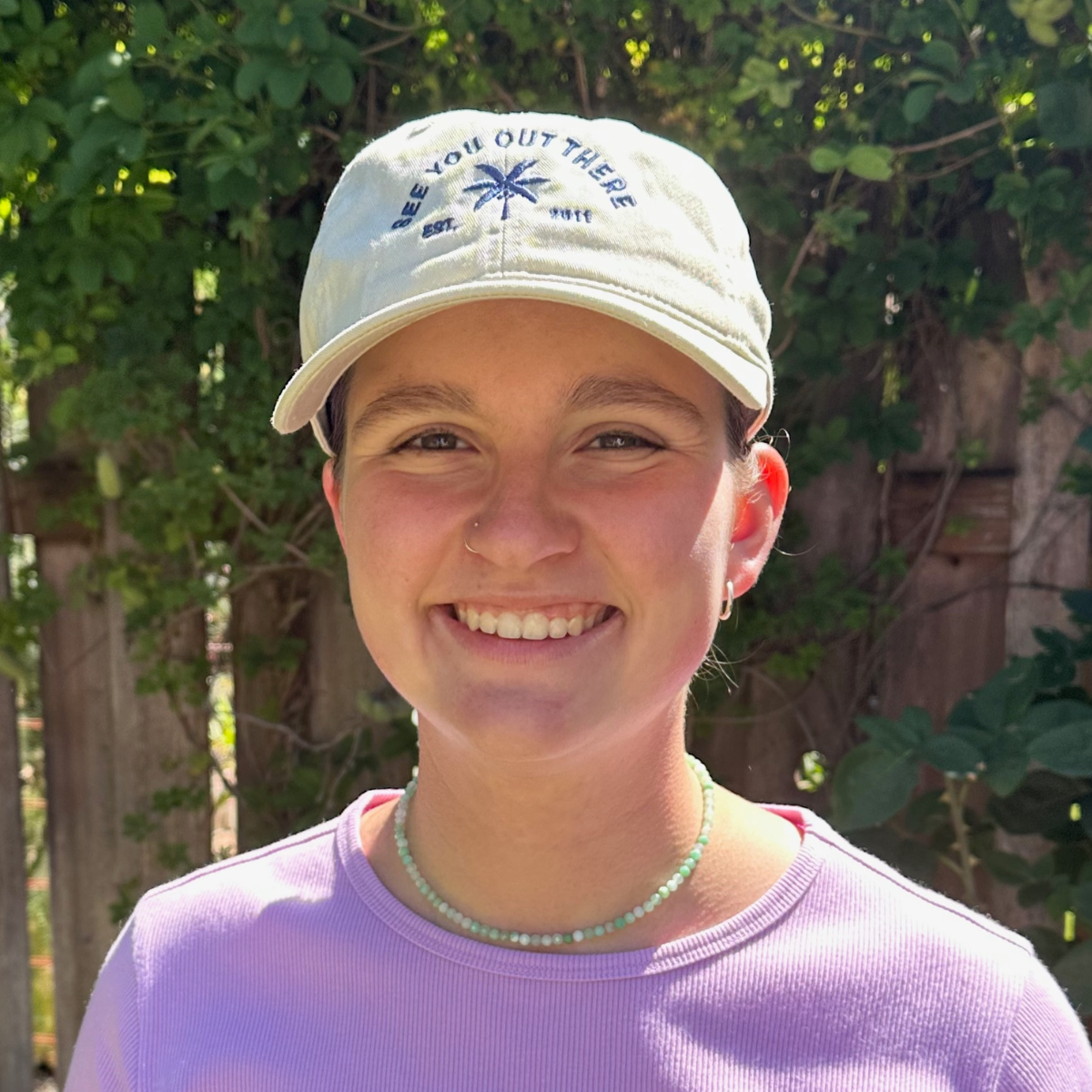 See You Out There Hat side angle mineral sunscreen brush applicator