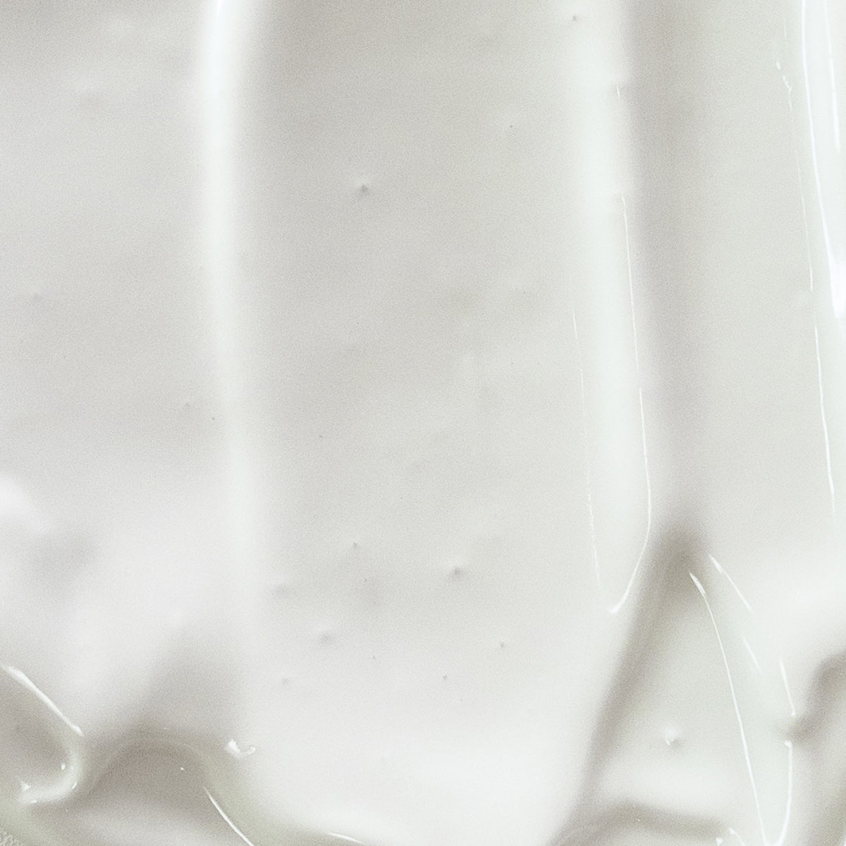 Sheer Genius SPF 50 Mineral Sunscreen + Moisture Untinted lifestyle shot mineral sunscreen brush applicator